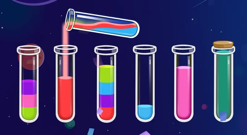 A red tube three-quarters full taking the pour that completes it, beside a pink tube one segment short